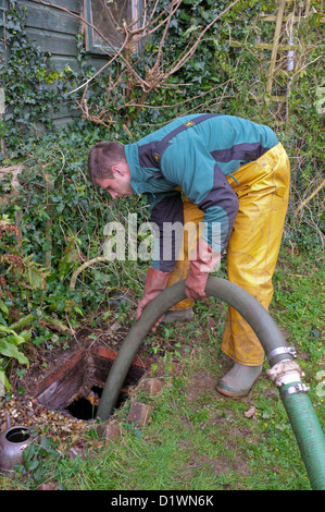 A septic tank being cleared Stock Photo