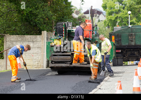 Tarmac being laid J CHAPLOW & SONS LTD, road building, Road Surfacing ...