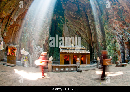Marble Mountains, ray of light illuminating Huyen Khong cave. Danang, Vietnam Stock Photo