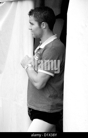 Cumberland & Westmorland Wrestler looking out of marquee at Grasmere Lakeland Sports,Lake District National Park,Cumbria, Stock Photo