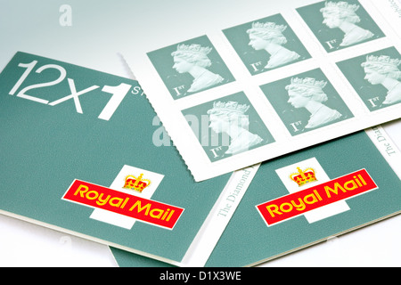 First class stamps for letter postage, new 2013 colour, england UK Stock Photo