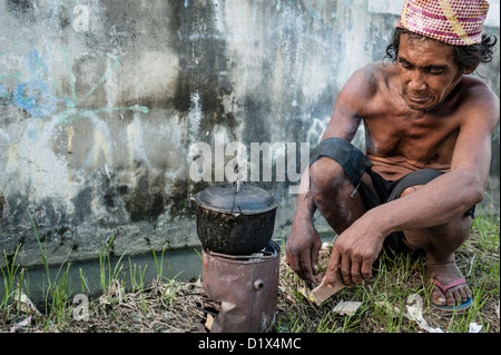 homeless streets visayas cebu philippines cooking man south asia east alamy