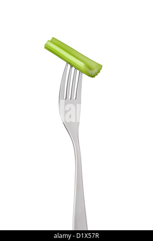 section of fresh green celery stick stalk on a fork isolated against white background Stock Photo