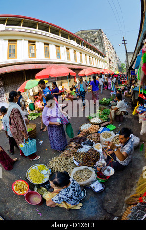 Busy street market in Central Yangon, Myanmar Stock Photo