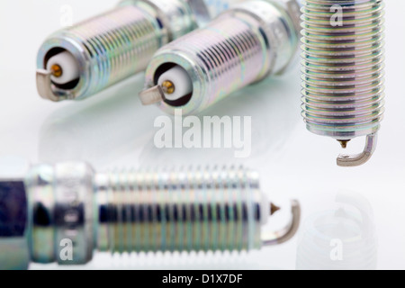 Close up of a spark plug isolated on white background Stock Photo