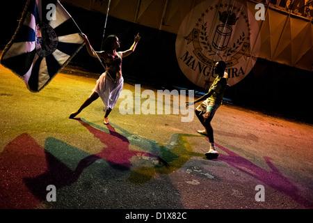 Rocinha samba school dancers rehearse their Carnival dance act in front of the school's workshop in Rio de Janeiro, Brazil. Stock Photo