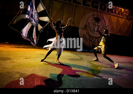 Rocinha samba school dancers rehearse their Carnival dance act in front of the school's workshop in Rio de Janeiro, Brazil. Stock Photo