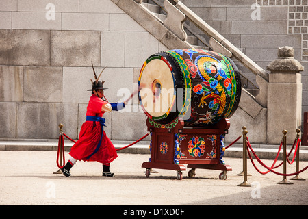 Striking The Ceremonial Drum Stock Photo