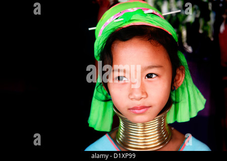 Portrait of a young Padaung girl at a village in Chiang Rai, Thailand, South East Asia. Stock Photo