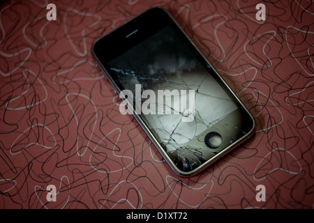 Apple iPhone with cracked screen Stock Photo