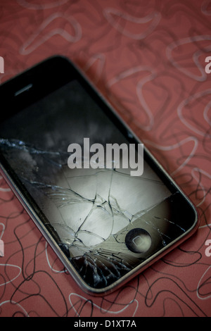 Apple iPhone with cracked screen Stock Photo