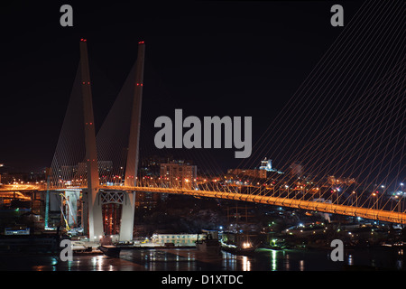 night view of the bridge in the Russian Vladivostok over the Golden Horn bay Stock Photo