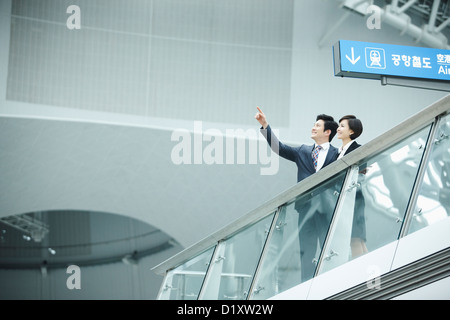 a businessman and woman in Incheon airport Stock Photo