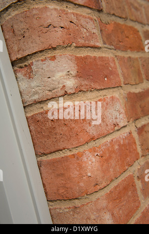 Close up of exterior brick wall on a newly converted barn in the English countryside. Stock Photo