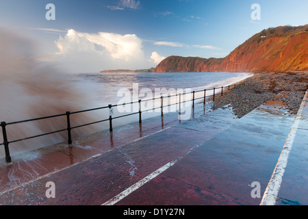 Waves crashing against walkway in Sidmouth, Devon, England, United Kingdom, Europe. Stock Photo
