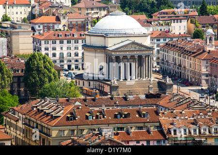 Rooftops in Turin looking across to Chiesa di Gran Madre di Dio in Italy. Stock Photo