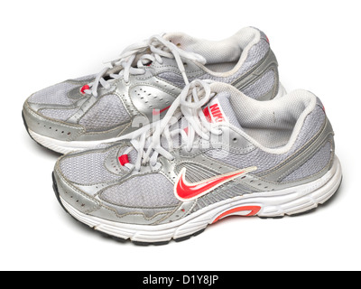 Grey Nike running shoes isolated on white background Stock Photo