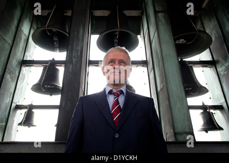 The new Mayor of Stuttgart Fritz Kuhn stands in front of the bells of the city hall tower during a press tour the day after being sworn in in Stuttgart, Germnay, 08 January 2013. Photo: MARIJAN MURAT Stock Photo