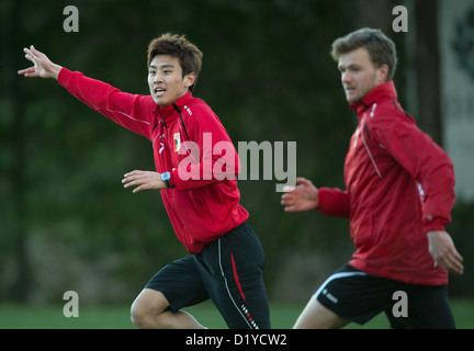 Augsburg's player Ja-Cheol Koo (l)asks for the ball during a practice session of Bundesliga soccer club FC Augsburg in the training camp in Belek, Turkey, 7 January 2013. In front of him runs his teammate Stephan Hain. Photo: Soeren Stache Stock Photo