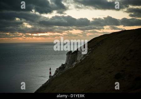 Dusk at Beachy Head Lighthouse beneath the cliffs near Eastbourne, East Sussex, UK Stock Photo