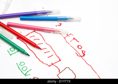 Young child's drawing on white paper with color pens Stock Photo