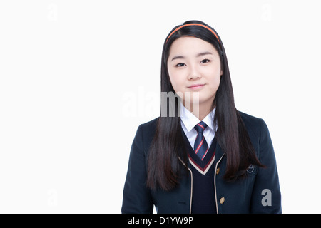 Female student in school uniform smiling Stock Photo - Alamy