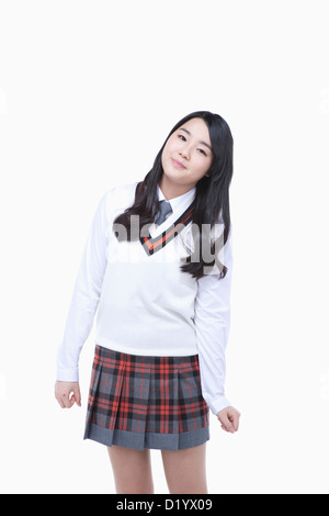 Asian student girl pose in library showing thumb up sign Stock Photo ...