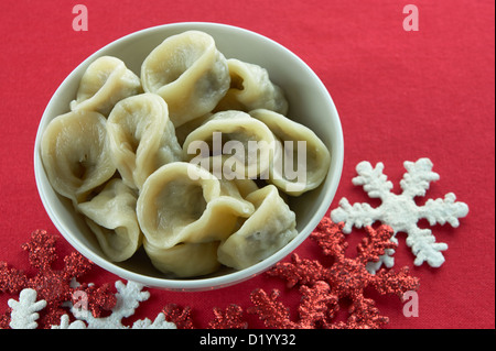 Polish traditional mushroom dumplings. Usually served with red borscht (czerwony barszcz) during Christmas Eve dinner / supper. Stock Photo