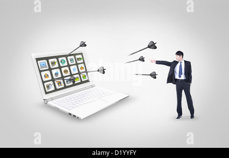 man dotting to the applications in the PC Stock Photo