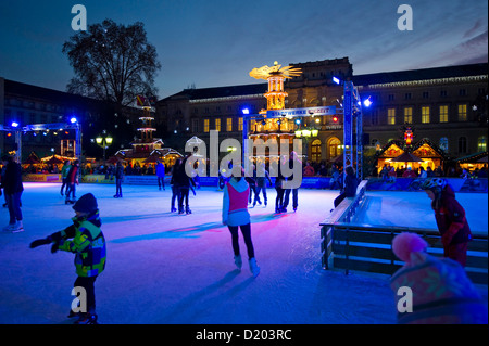 People ice skating at the Christmas market, Karlsruhe, Baden-Wuerttemberg, Germany Stock Photo