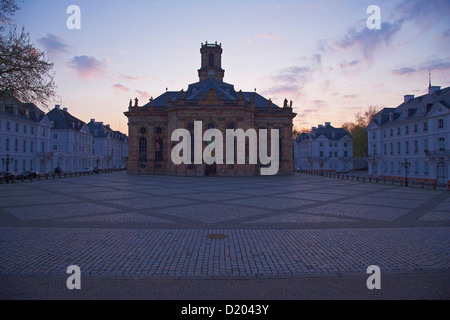 Baroque ensemble of Ludwigskirche with Ludwigsplatz square at dusk, Old town, Saarbruecken, Saarland, Germany, Europe Stock Photo