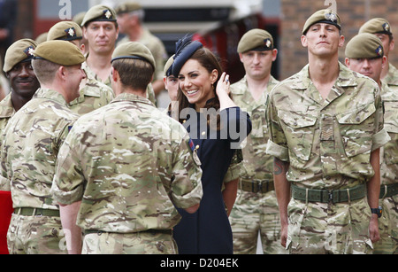 The Duchess of Cambridge, Kate Middleton, hands out operational medals to soldiers from 1st Battalion Irish Guards. Stock Photo