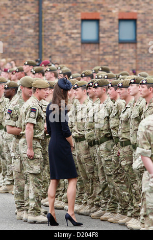 The Duchess of Cambridge, Kate Middleton, hands out operational medals to soldiers from 1st Battalion Irish Guards. Stock Photo