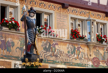 Fountain sculpture of a soldier of the Old Swiss Confederacy on the city fountain, Stein am Rhein, Switzerland Stock Photo