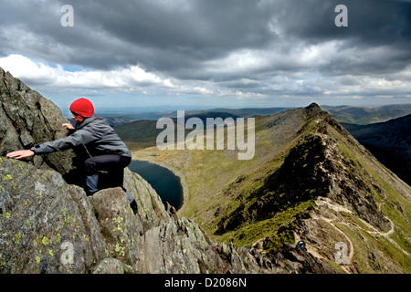 Climber on Striding edge -Helvellyn  a mountain in the English Lake District Stock Photo