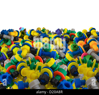 Color toy plastic bolts and nuts on white background Stock Photo