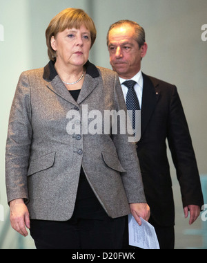 German Chancellor Angela Merkel (CDU) and Prime Minister of Malta, Lawrence Gonzi, walk to a joint press conference in Berlin, Germany, 09 January 2013. Gonzi met Merkel for bilateral talks at the Federal Chancellery. Photo: MICHAEL KAPPELER Stock Photo
