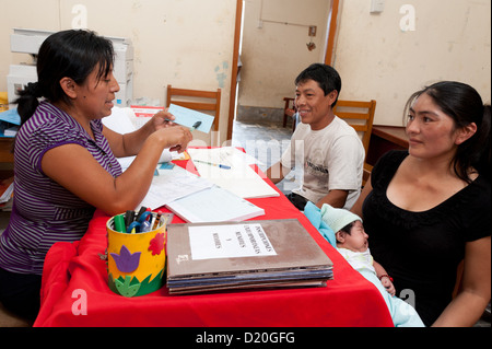 NGO Plan International's campaign for birth registration in northern Peru. - About 50% of the children in developing countries don't have a birth certificate. This is a requirement for a place in school, health care and other social benefits, a passport. Stock Photo