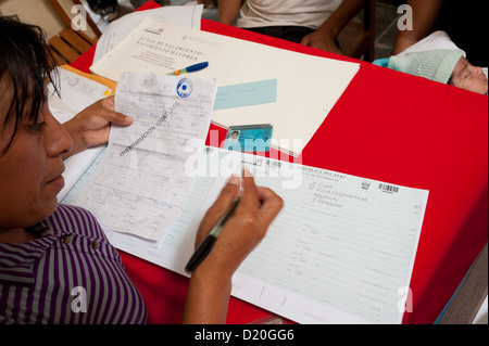 NGO Plan International's campaign for birth registration in northern Peru. - About 50% of the children in developing countries don't have a birth certificate. This is a requirement for a place in school, health care and other social benefits, a passport. Stock Photo