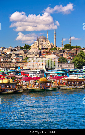 The Suleymaniye Mosque  on the Third Hill with a ferries on the banks of the Golden Horn, Istanbul Turkey Stock Photo