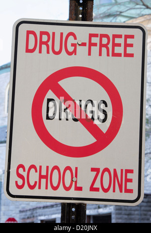 Drug Free School Zone sign in front of the school. Stock Photo