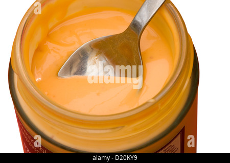 Spoon In a Jar Of Seafood Sauce Stock Photo
