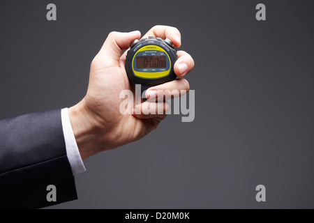 stop watch in hand Stock Photo