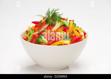 colorful vegetable salad or red, yellow and orange sweet pepper, broccoli and fennel salad Stock Photo