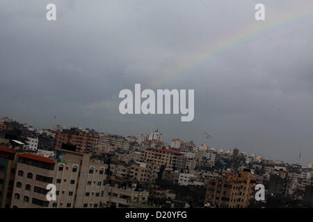 Jan. 10, 2013 - Gaza City, Gaza Strip, Palestinian Territory - A rainbow is seen over Gaza city on a windy winter day on January 10, 2013  (Credit Image: © Ashraf Amra/APA Images/ZUMAPRESS.com) Stock Photo