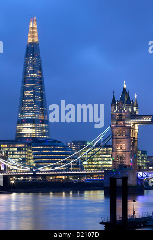 View along river Thames with Tower Bridge and new Shard Building at night,London,England,Europe. Stock Photo