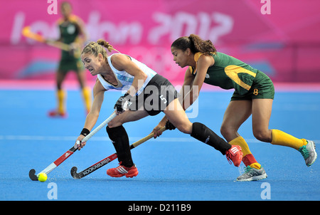 Macarena Rodriguez Perez (Argentina, 5) and Marsha Marescia (South Africa). ARG Vs RSA. Womens Hockey. Riverside Stadium. Stock Photo