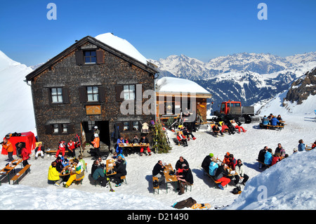 People in front of Wormser hut under the Hochjoch, ski area Silvretta Montafon in the Montafon, Vorarlberg, Austria, Europe Stock Photo