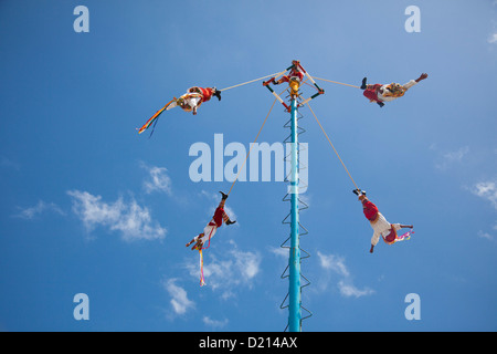 The Danza de los Voladores, Dance of the Flyers, or Palo Volador, Pole Flying, is an ancient Mesoamerican ceremony and ritual, T Stock Photo