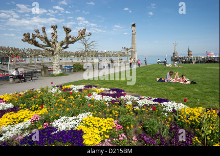 Imperia statue and people in a meadow, Konstanz, Lake Constance, Baden-Wuerttemberg, Germany, Europe Stock Photo